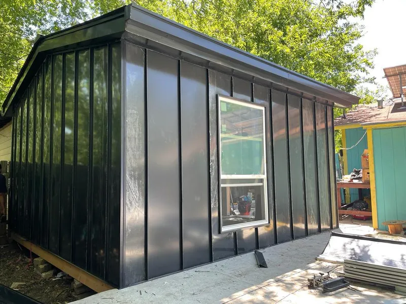 Black standing seam metal wall panels for Roof Inspection in Abington