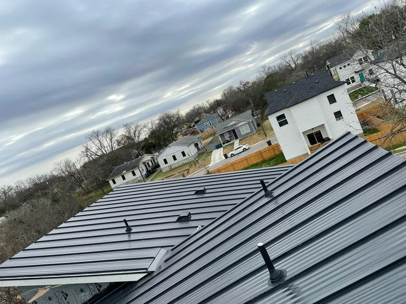 Standing seam metal roof panels with vents for Skylight Repair in Abington